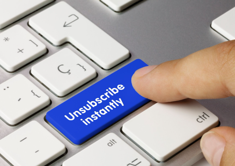 Unsubscribe instantly - Inscription on blue keyboard key